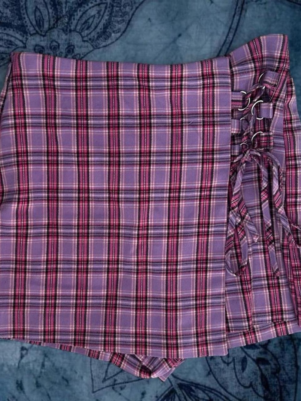 Pinkish purple plaid skirt with lace up side detail by SO